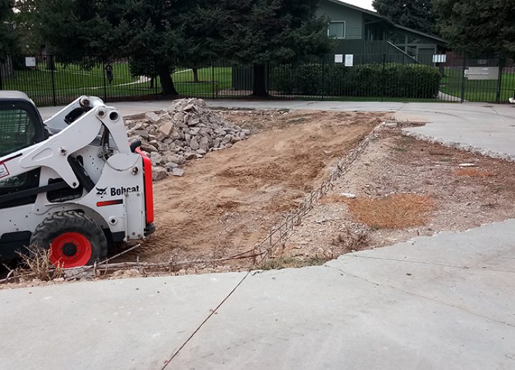 Bobcat loader working on construction site excavation